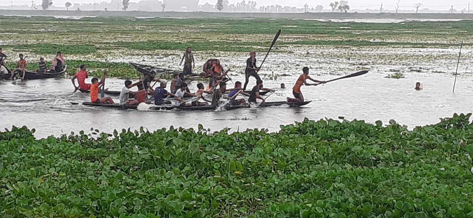 আতুকুড়া গ্রামের ডিঙ্গি নৌকা বাইচ প্রতিযোগিতা অনুষ্ঠিত ডেঙ্গি নৌকা বাইচ প্রতিযোগিতা\